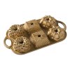 Formă pentru tort GEO BUNDLETTE BUNDT , pentru 6 prăjituri minibundt, de diferite forme, aurii, Nordic Ware